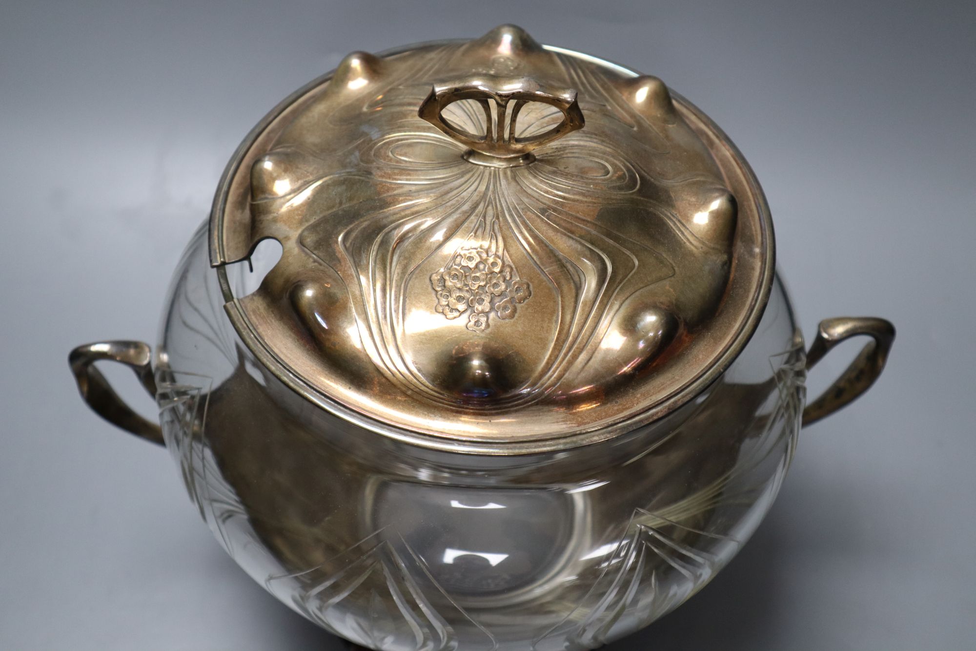 An Art Nouveau Orivit pewter and cut glass punch bowl, height 31cm